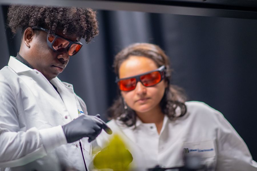 Electrical engineering students in the optics lab