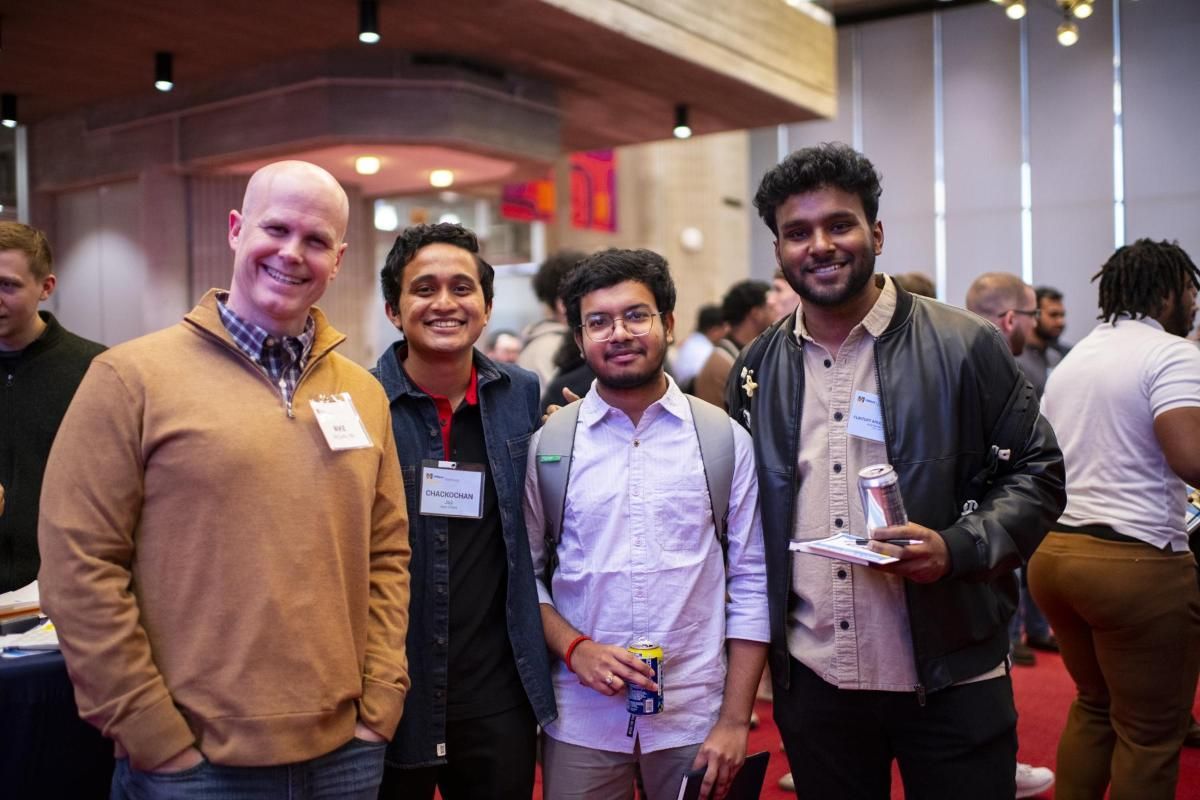 Alumni and students at networking event