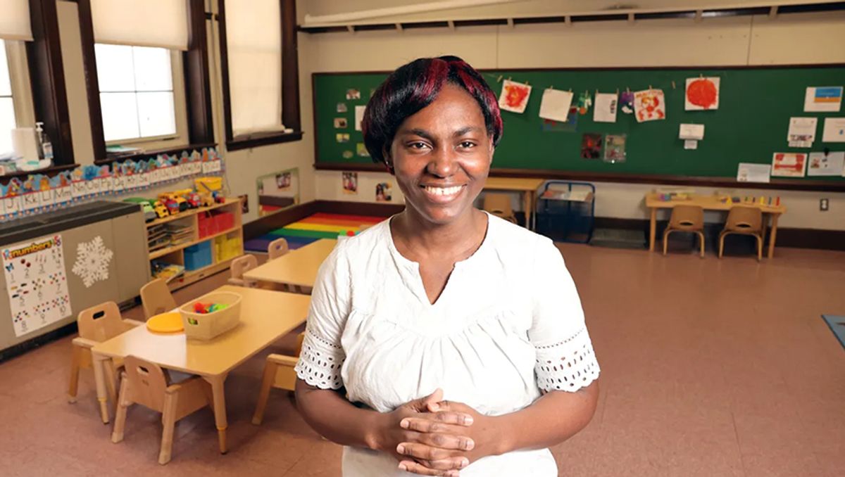 Standing in Head Start classroom