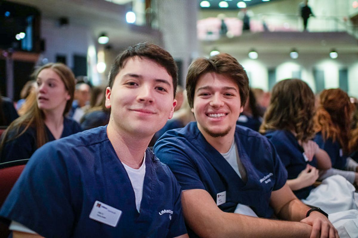 Male nursing students in audience