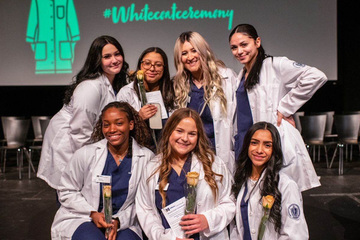 Nursing students celebrating after the ceremony