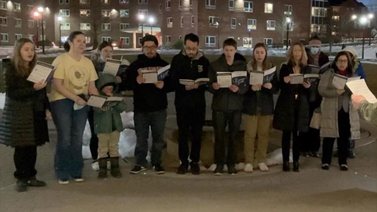 The choir gives an impromptu performance of 