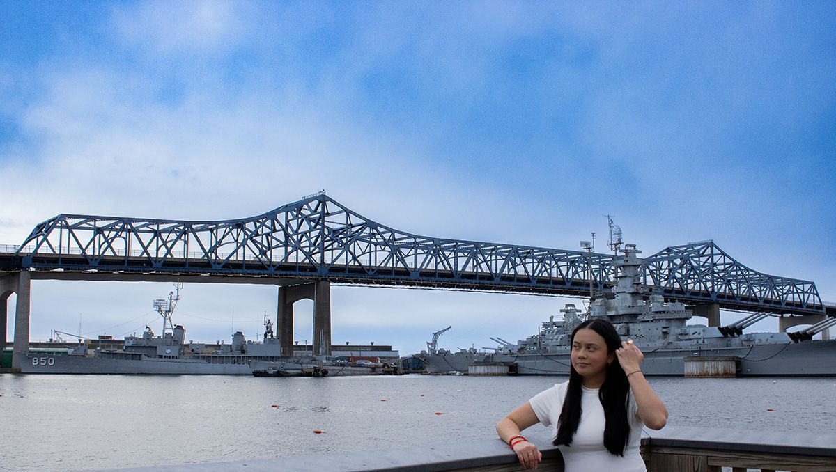 Guadalupe Garcia Carrillo headshot in front of the Braga Bridge