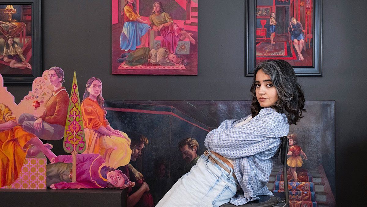 Sarah Valinezhad with artwork