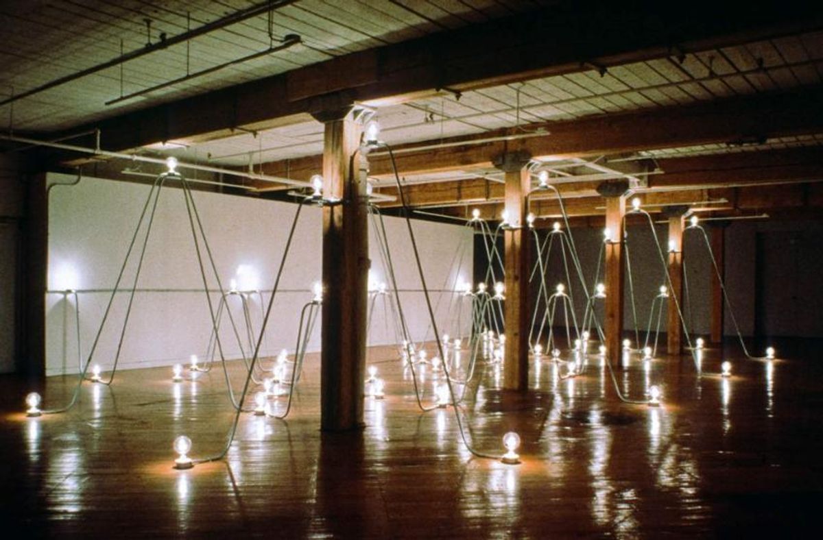 Nancy Holt, Electrical System II: Bellman Circuit (1982) David Bellman Gallery, Toronto, Canada - 3/4 in. steel conduit, lighting and electrical fixtures, light bulbs, electrical wire - Length: 55 ft. (16.7 m); Width: 24 ft. (7.3 m); Height: 9 1⁄2 ft.(2.9 m) © Holt/Smithson Foundation, Licensed by VAGA at ARS.