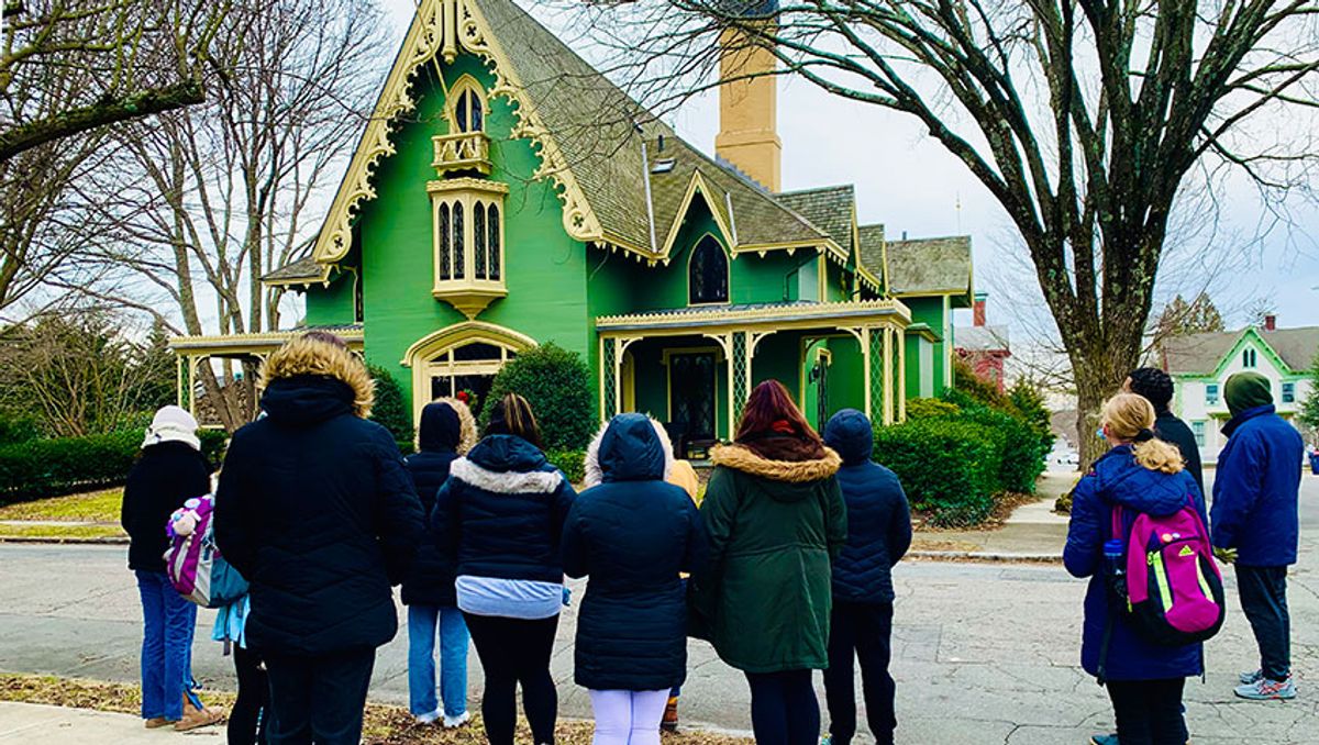 Kayla shown here (with red backpack) during an architectural tour of New Bedford. The style shown is Gothic Revival. Photograph courtesy of Pamela Karimi.