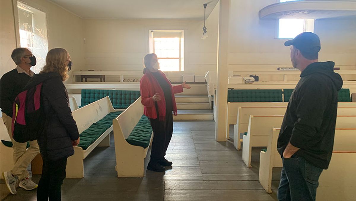 Kayla shown here with Rick Finneran, Martha Mangelsdorf, and William diGiacomantonio who generously offered an extensive tour of the Quaker Friend’s Meeting House. Photograph courtesy of Pamela Karimi.