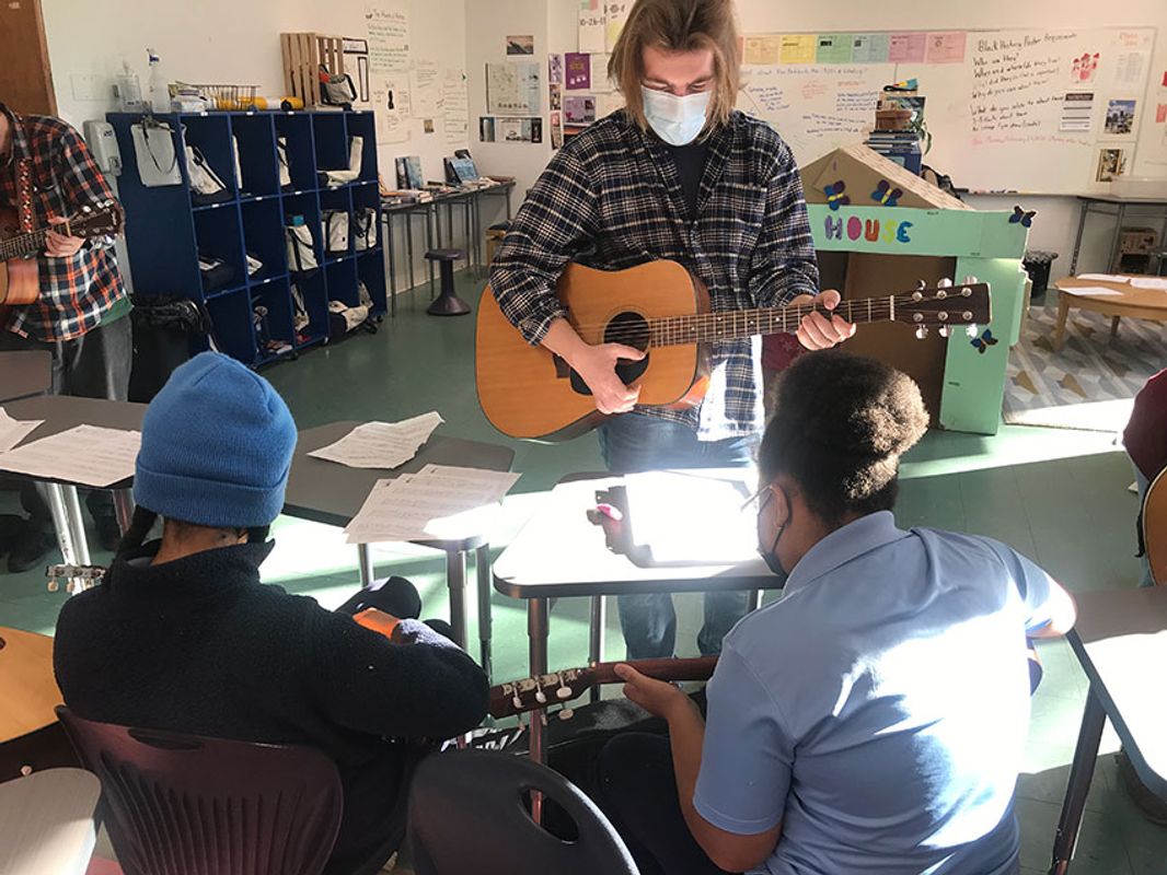 Steven leads a group of guitarists through “You Are My Sunshine.”