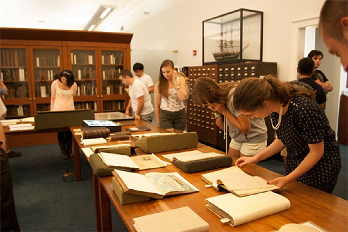 Art History students visit the visual collections of the Whaling Museum archives in New Bedford.