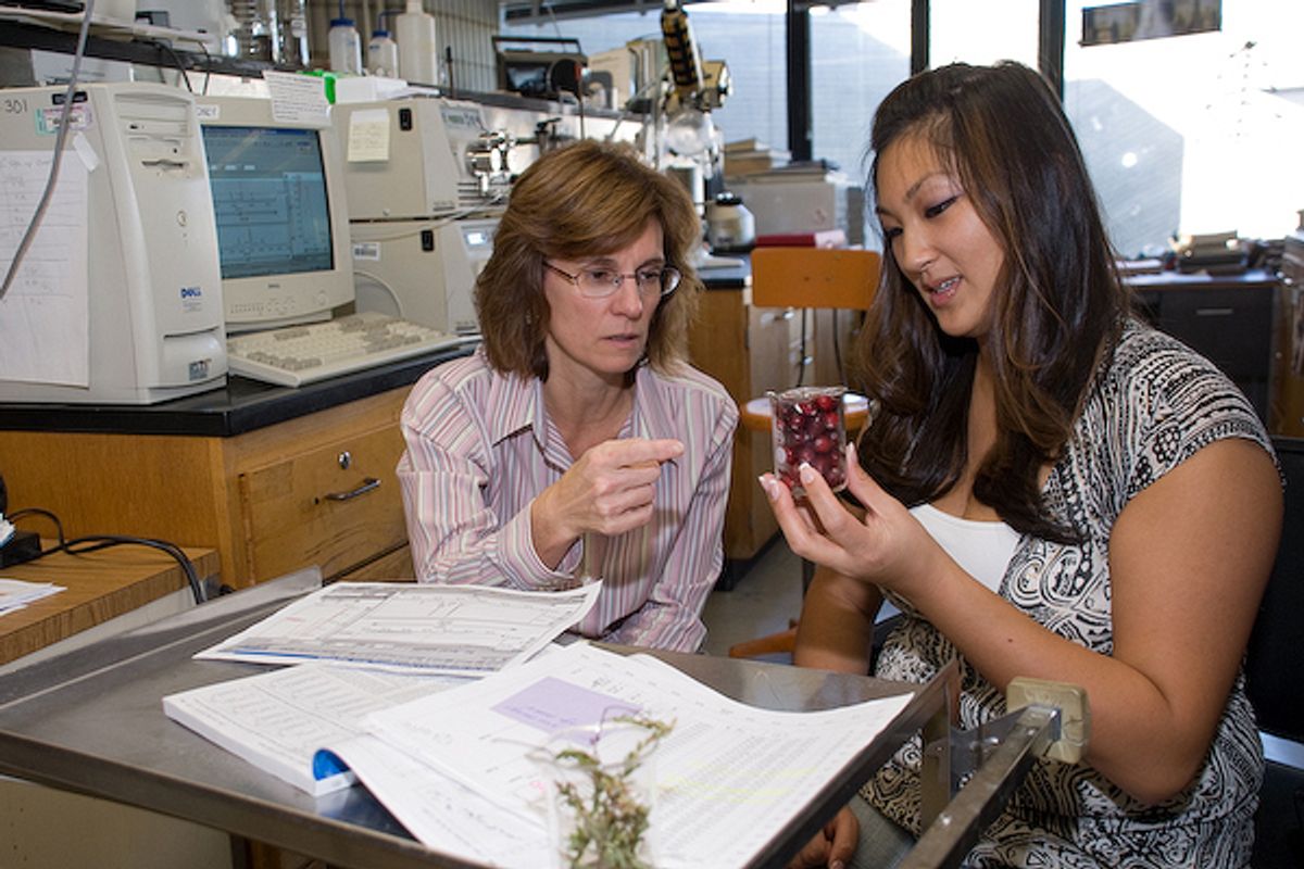 UMass Dartmouth Website photo with Chrissy Dao (right) and Dr. Catherine Neto (left) 