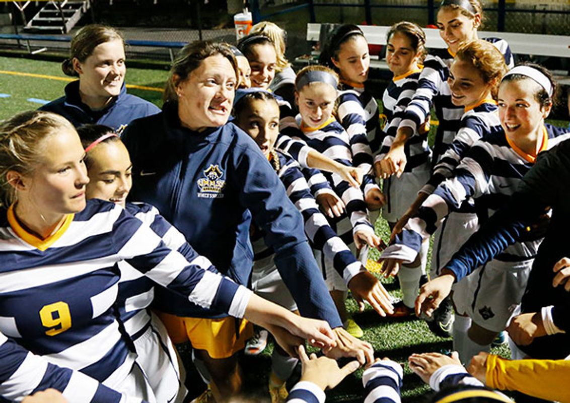 Kayleigh Ellison with the Women's Soccer Team. Photo credit: Mike Valeri/The Standard-Times/SCMG