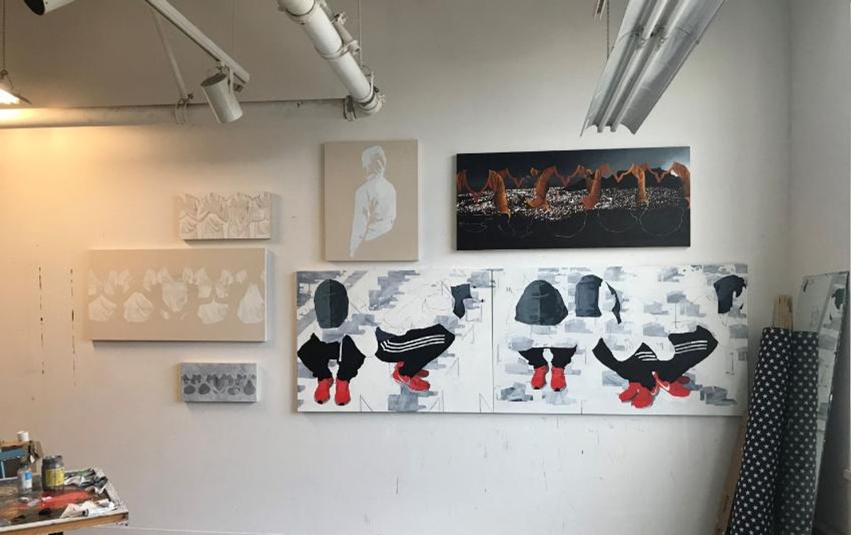 Taylor Maroney works in the gallery