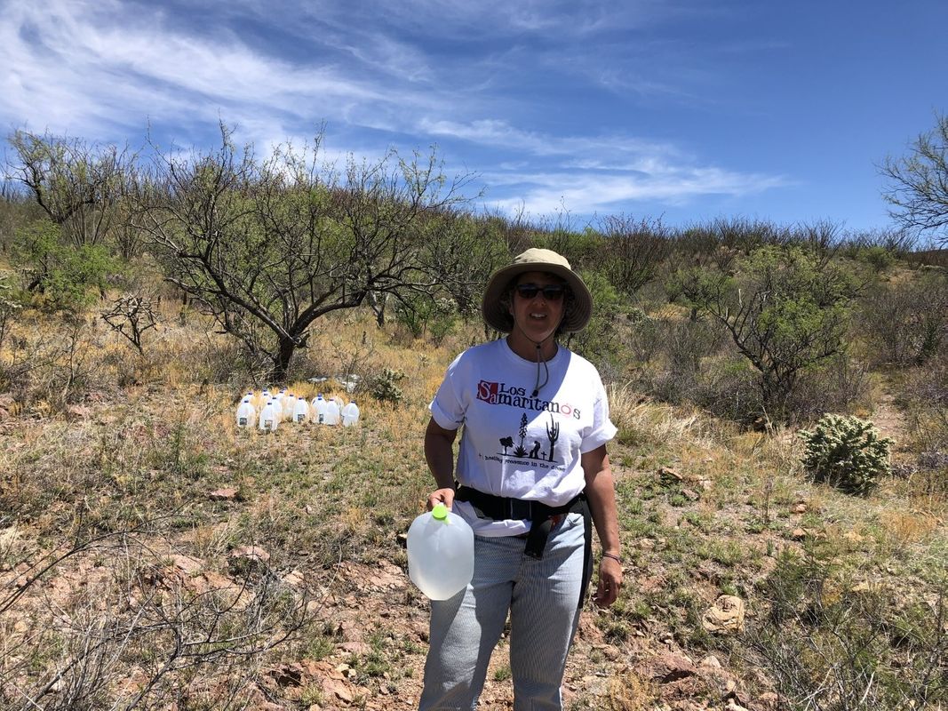 UMass Law Professor Hillary Farber dropping water in the Arizona desert