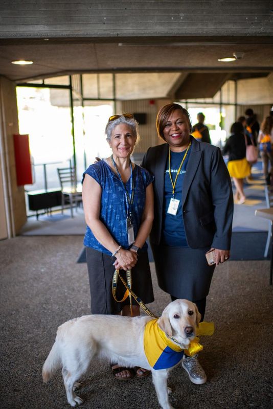 chris peter, kimberly scott and gracie the lab at orientation
