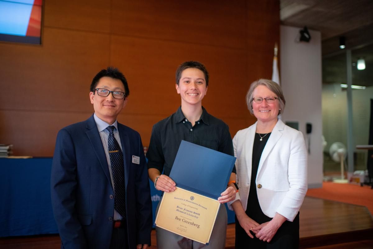 Bee Greenberg receives scholarship certificate from Jean VanderGheynst and Haiping Xu