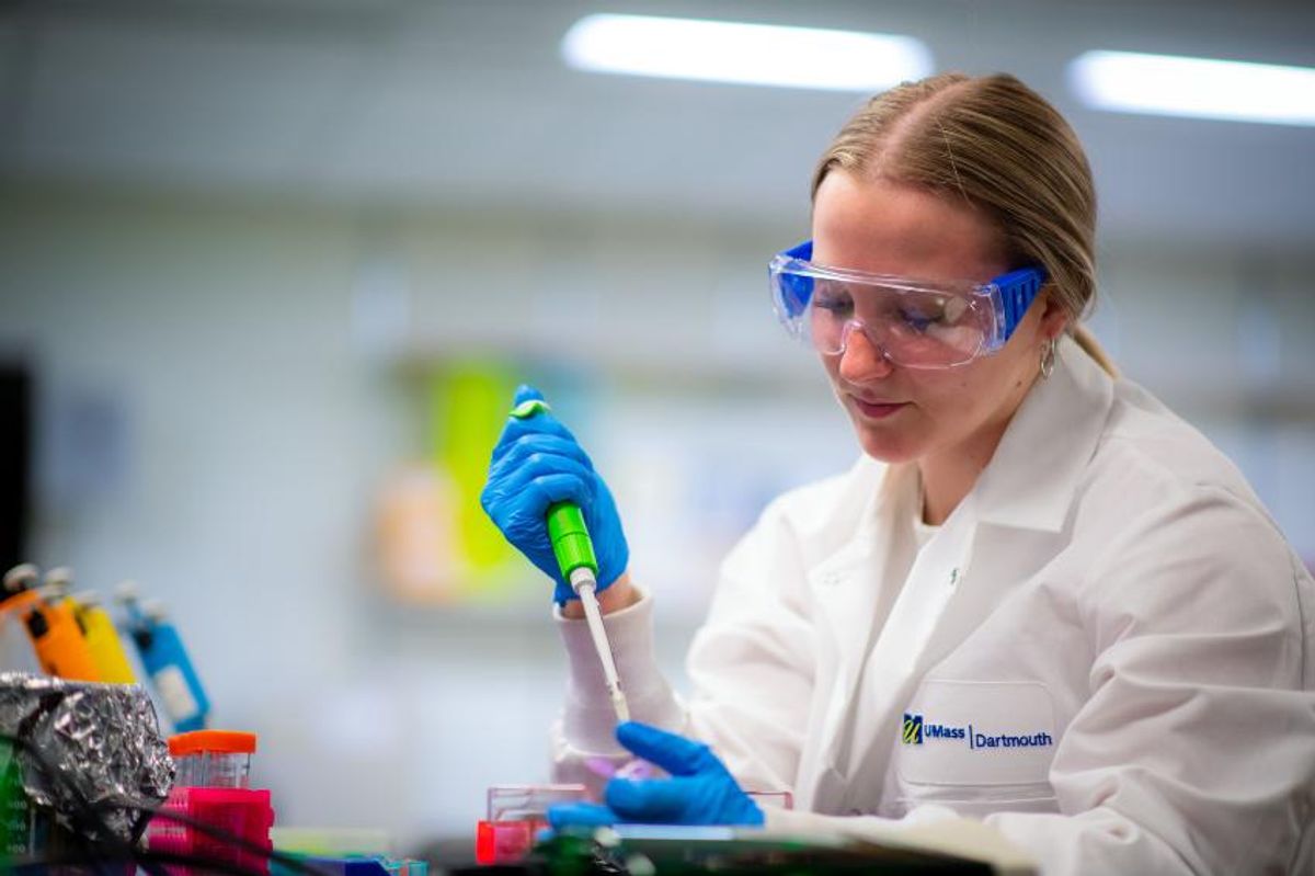 Bioengineering student Jackie Horgan wearing goggles and labcoat in her lab