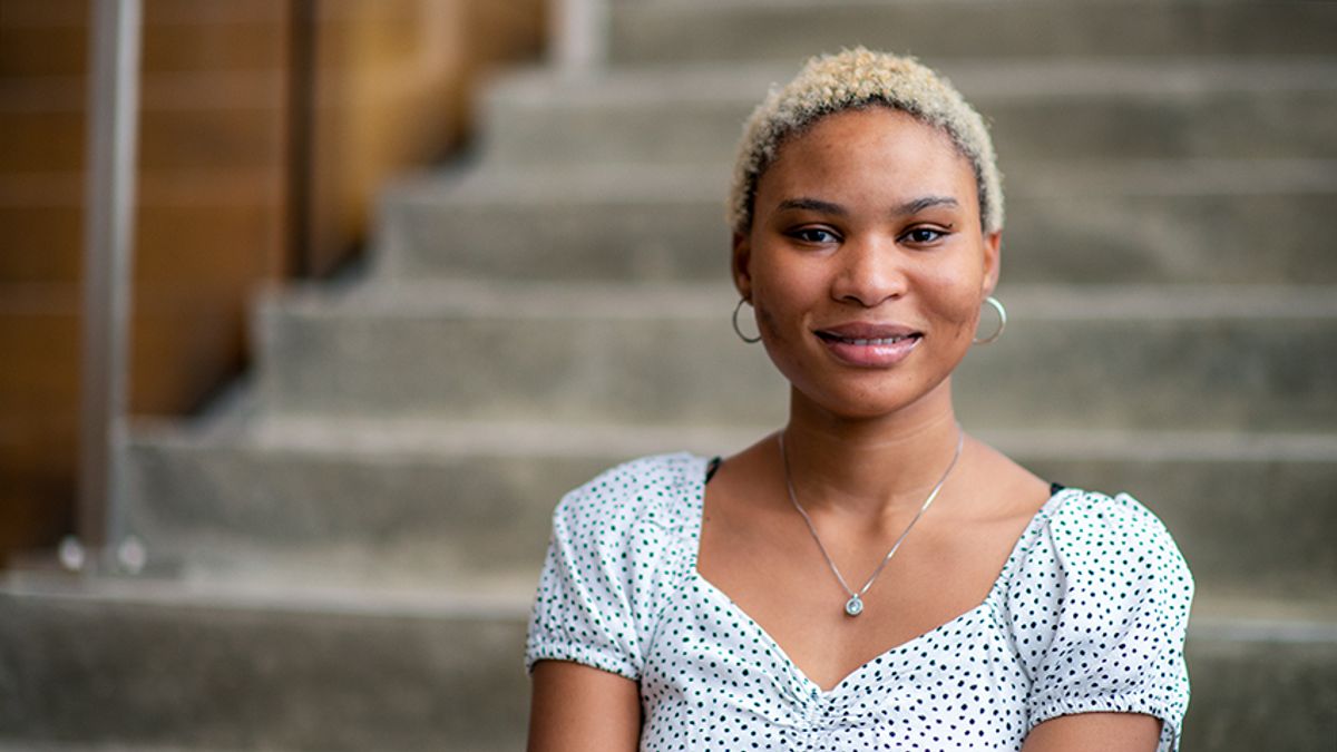 Efe Oboh-Idahosa pictured in the Claire T. Carney Library