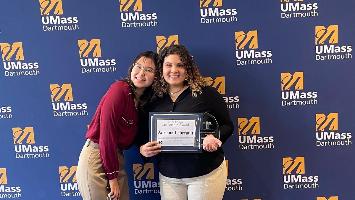 Adriana Lebreault posing with the Susan T. Costa Leadership and Committee of the Year awards at the Spring Leadership Award Ceremony in 2023.