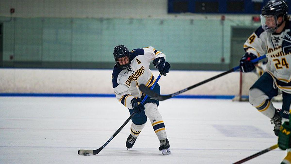 Cade Hanley sets up a shot