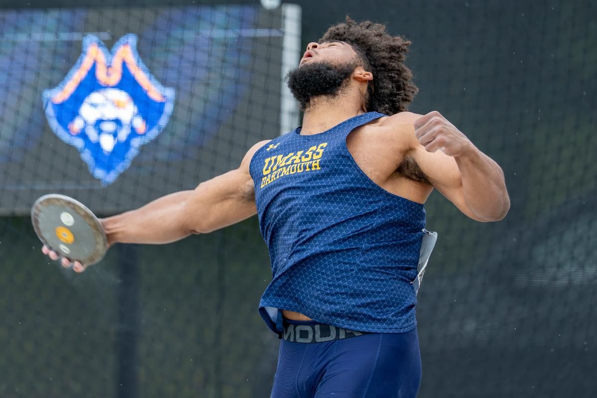 Ancil Alexander throws a discus