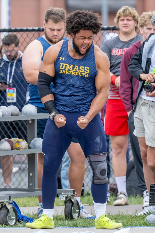 Ancil Alexander celebrates after a shot put