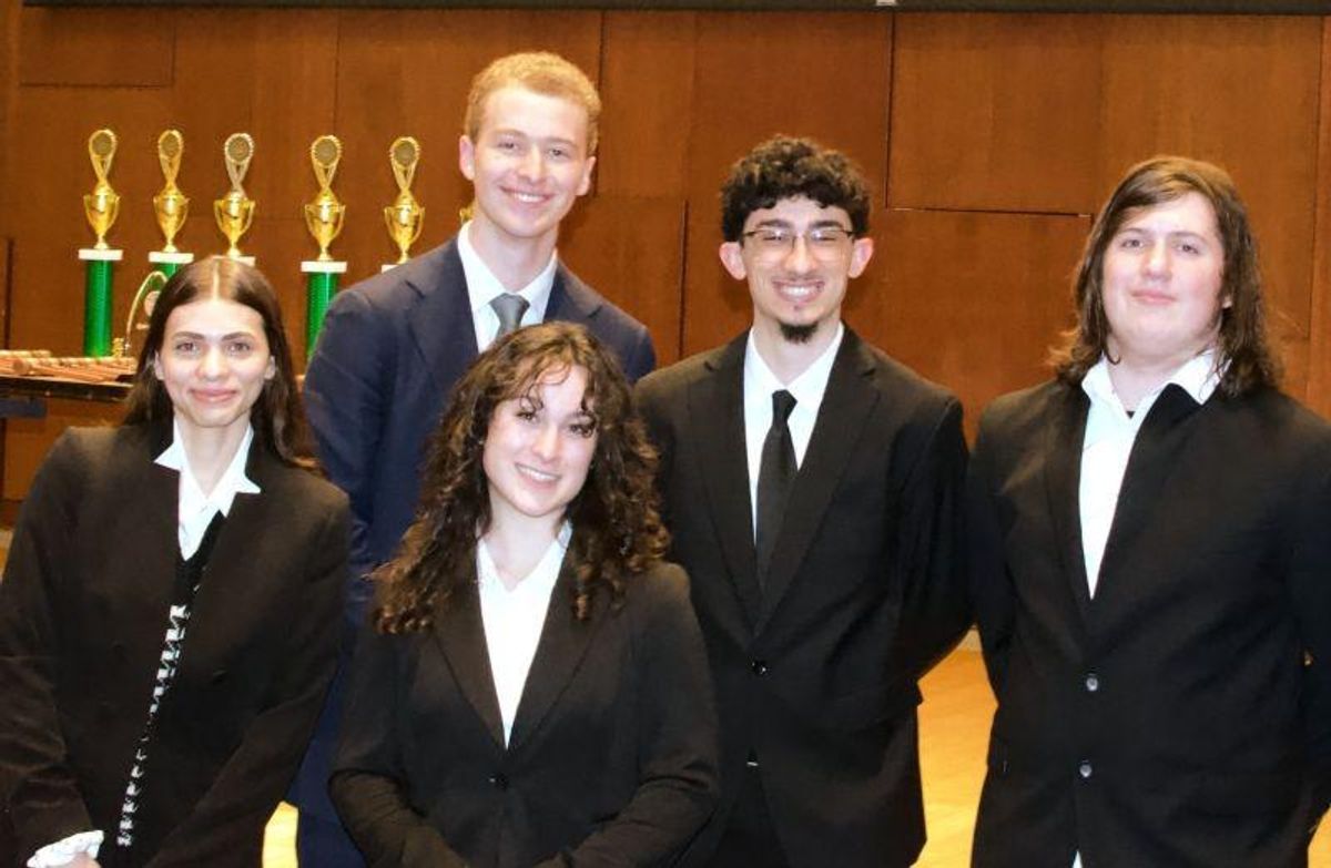 The 2025 UMassD Mock Trial E-Board at the regionals competition