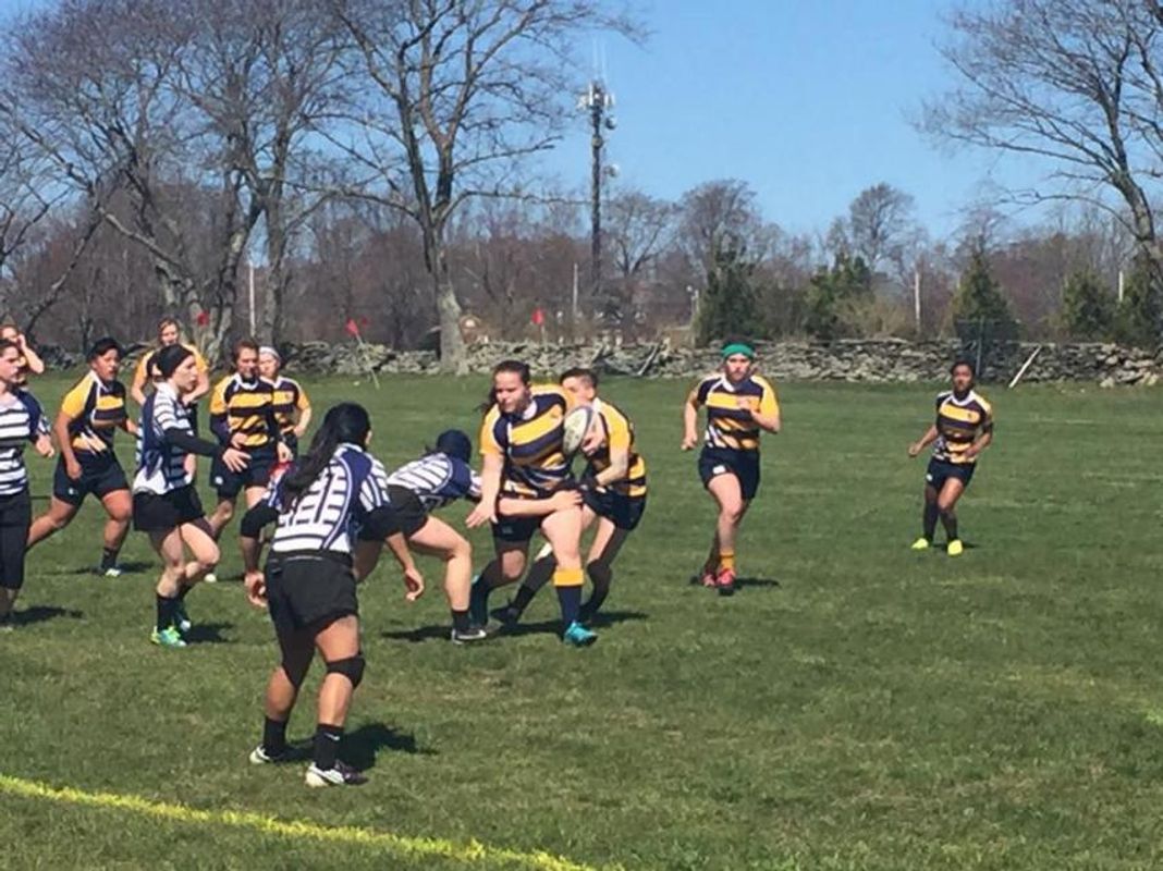 Mollie Madigan playing rugby