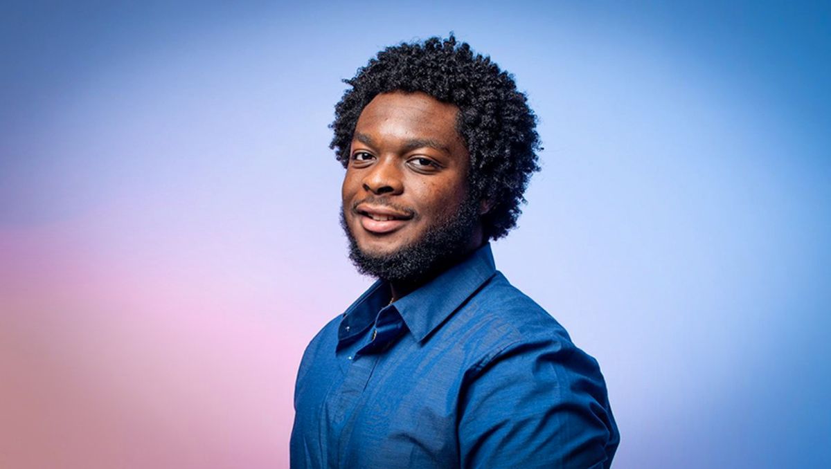Head shot with blue and pink background