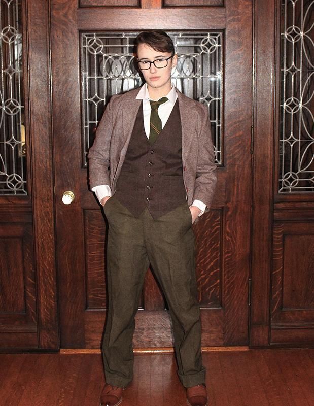 Student dressed up as male character in play