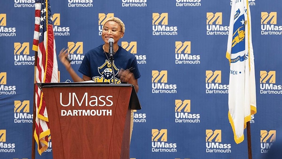 Speaking in front of podium