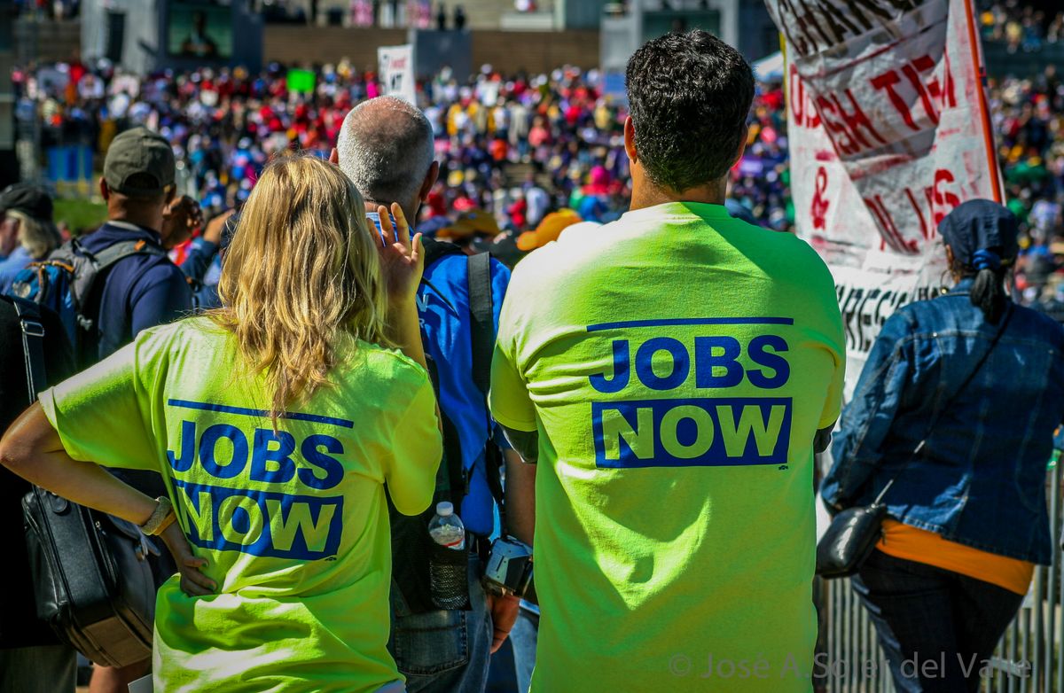 Individuals standing with 