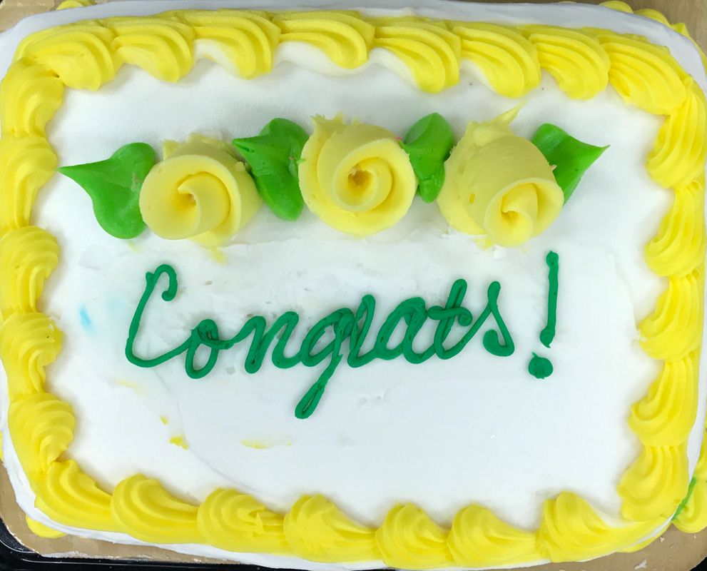 Cake with the word Congrats on it