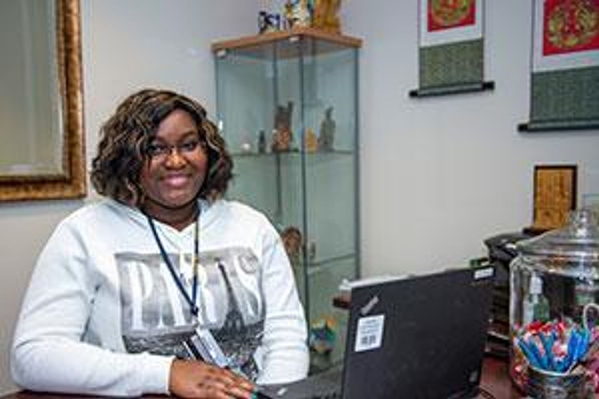 Oriane Pitah sitting at desk