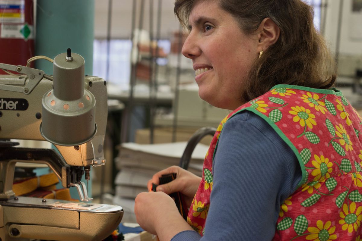 Woman working in Fall River mill sewing