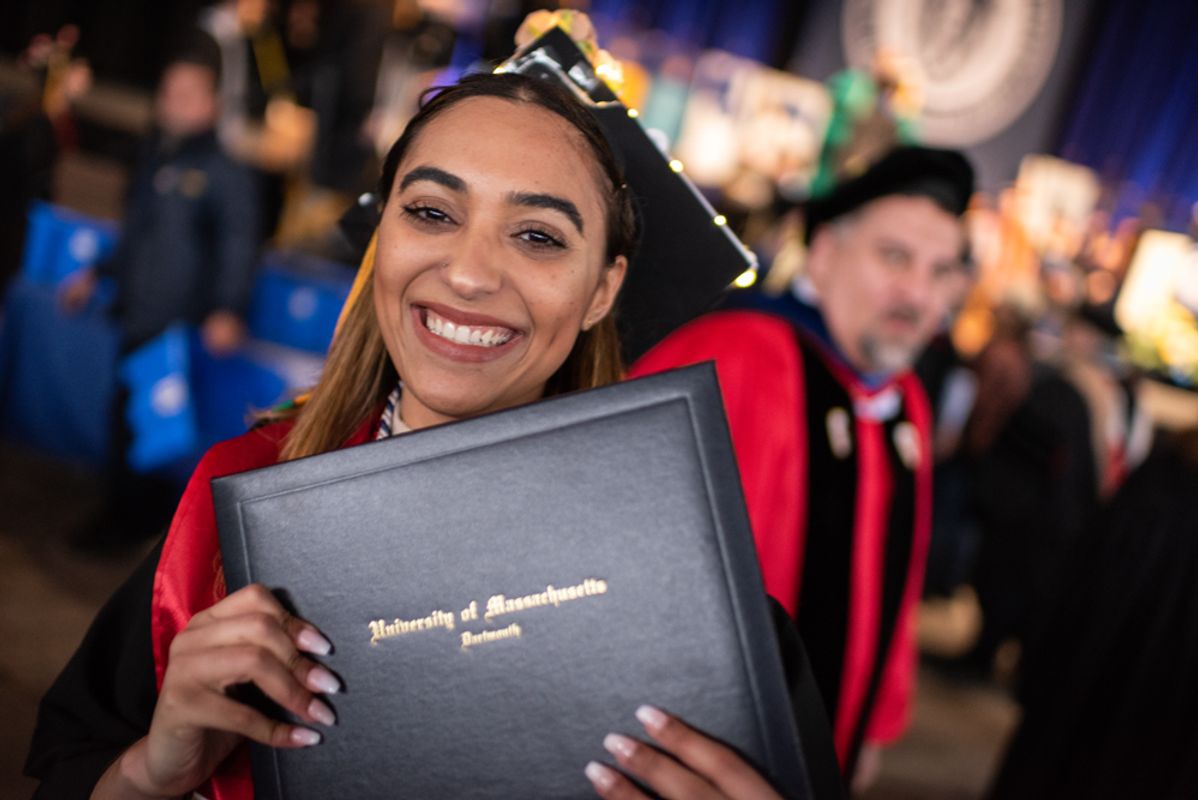 Student holding diploma