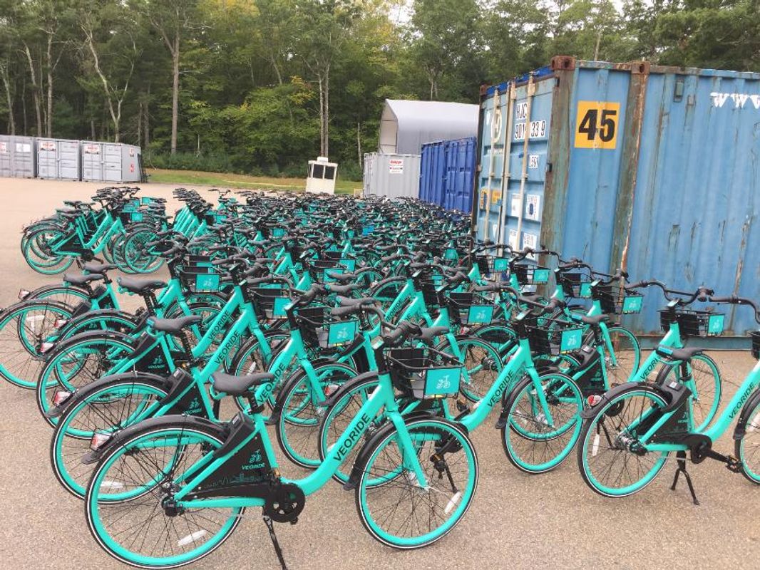 Bikes being unloaded on campus