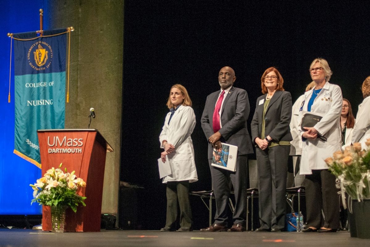 Photo of speakers on stage during 2019 White Coat Ceremony