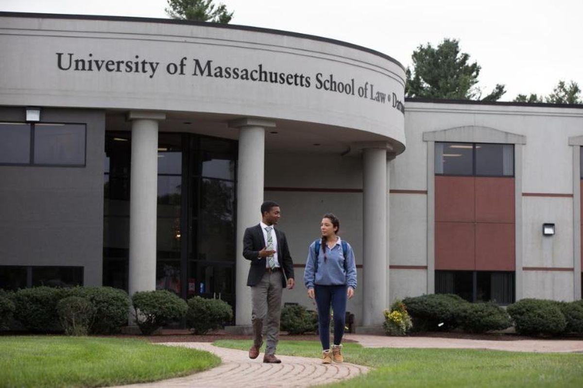 Students walking in front of law school