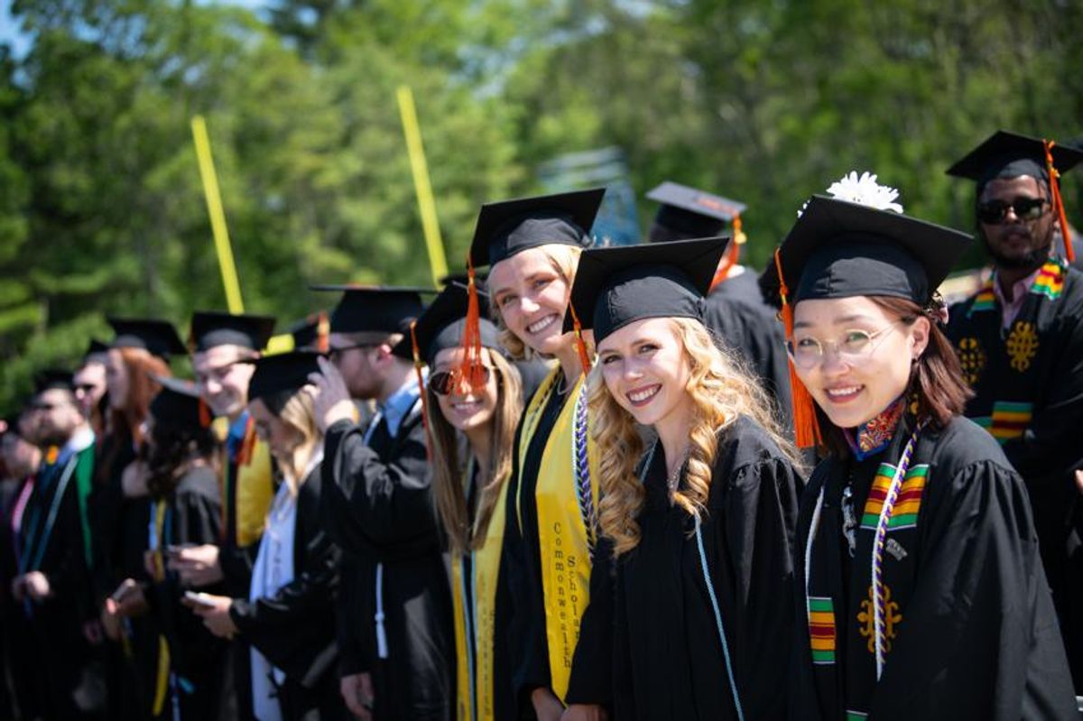 Students at graduation in regalia