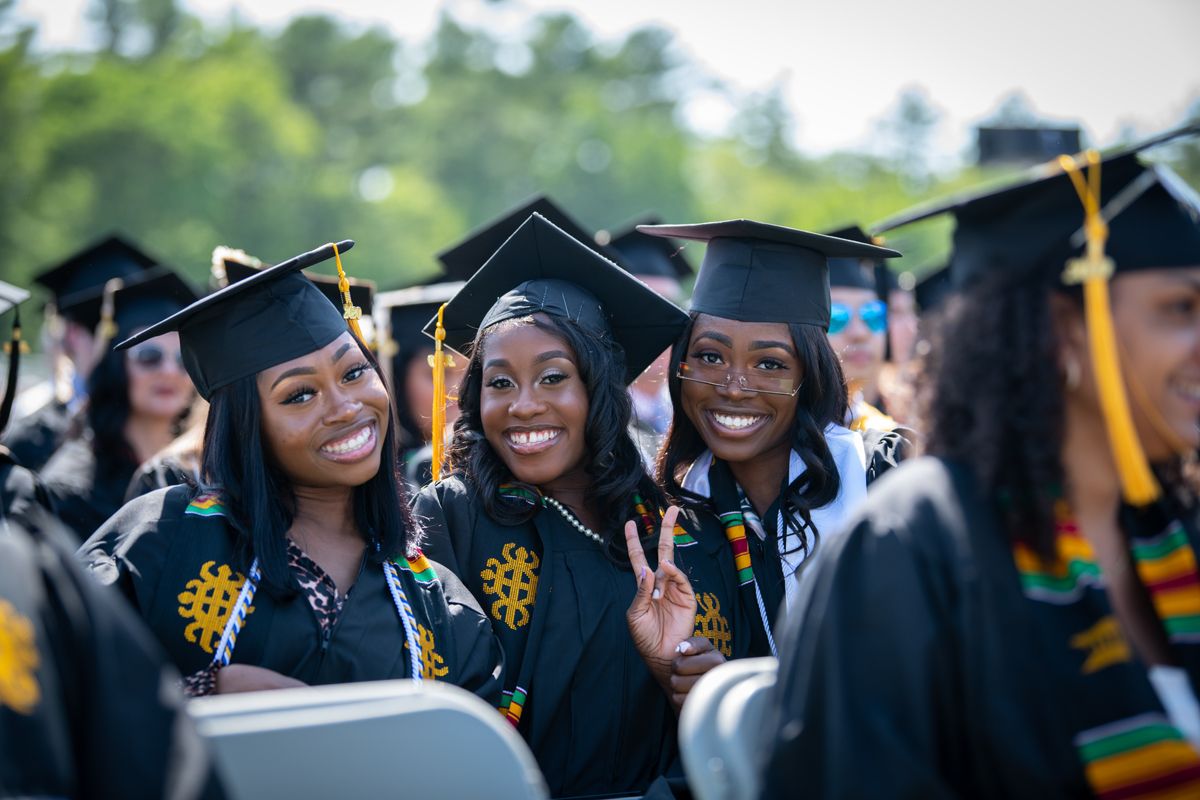 Students at graduation in regalia