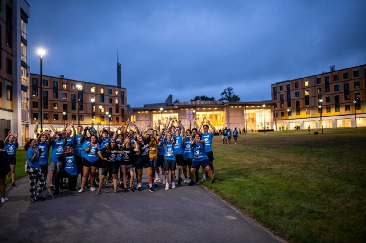 students posing on first year quad
