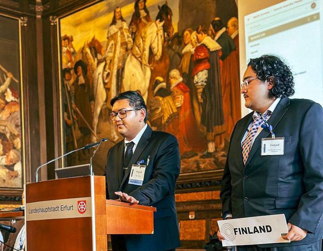Daniel Flores presents his group's paper at the Model U.N. competition in Erfurt, Germany.