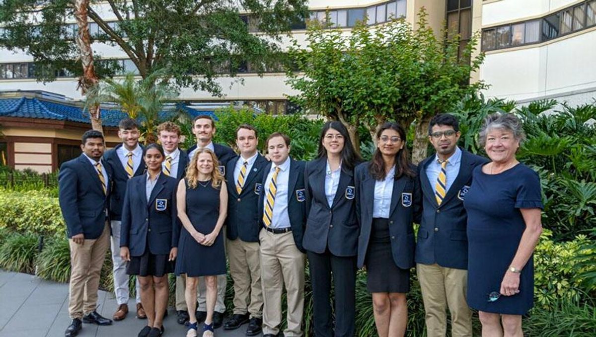 The UMassD DECA team pictured in Orlando
