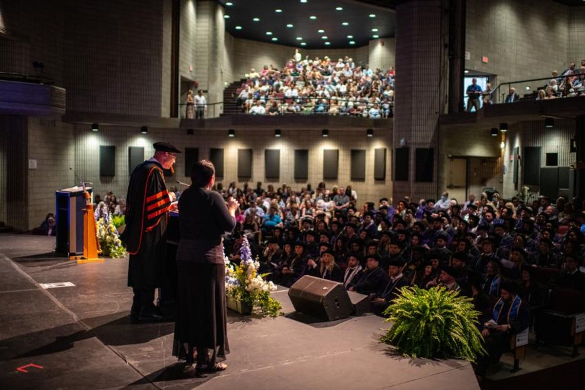 Dean Mitnick speaking to audience