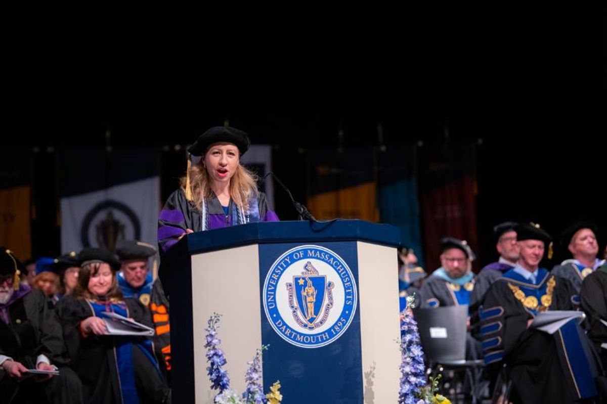 law student speaker at podium