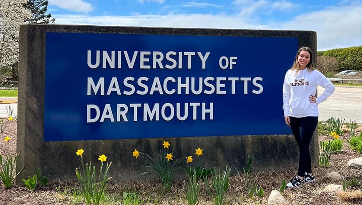 Incoming first-year Kailey Sousa pictured at UMassD's sign at the campus entrance