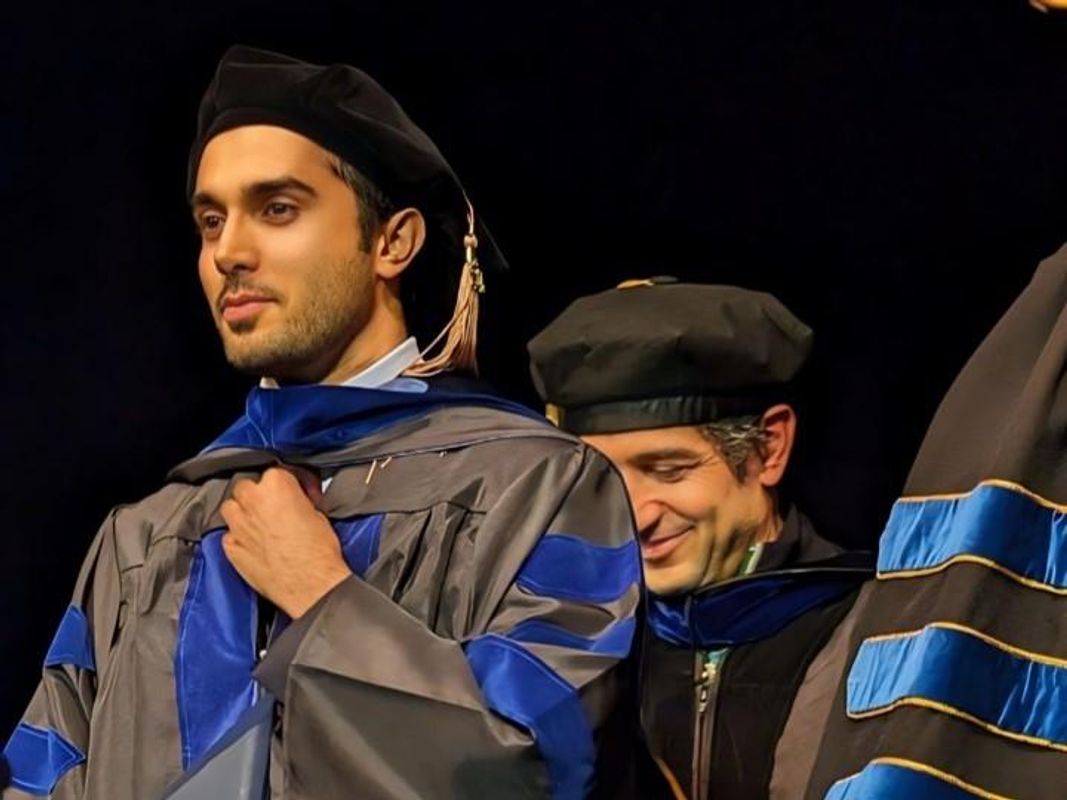 Shayan Razi PhD '24 at the 2024 commencement ceremony