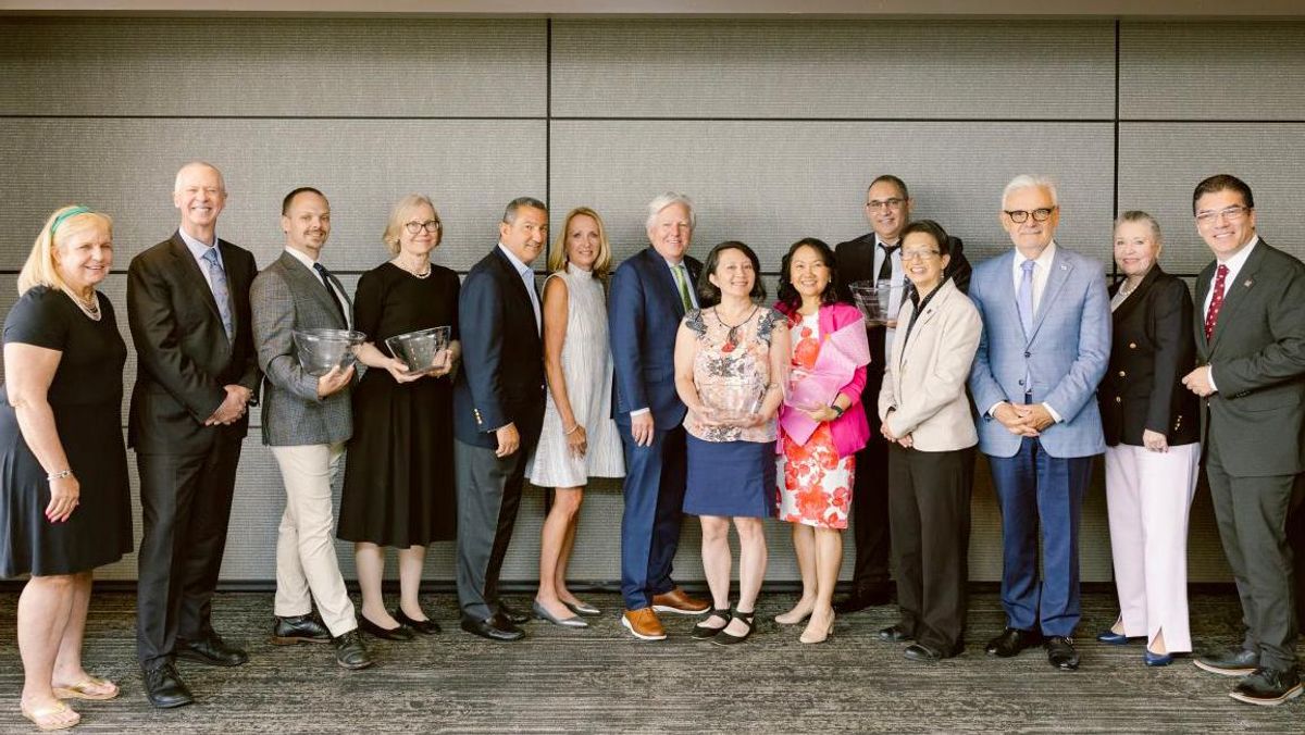 Manning Prize winners pictured with UMass President Marty Meehan, Robert and Donna Manning, and UMass Chancellors.