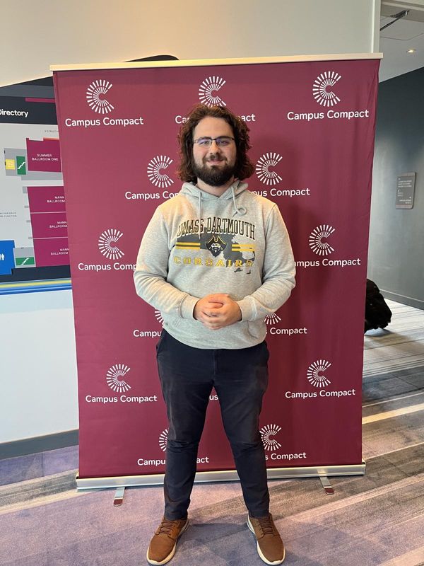 Student Gent Haviari posing for photo