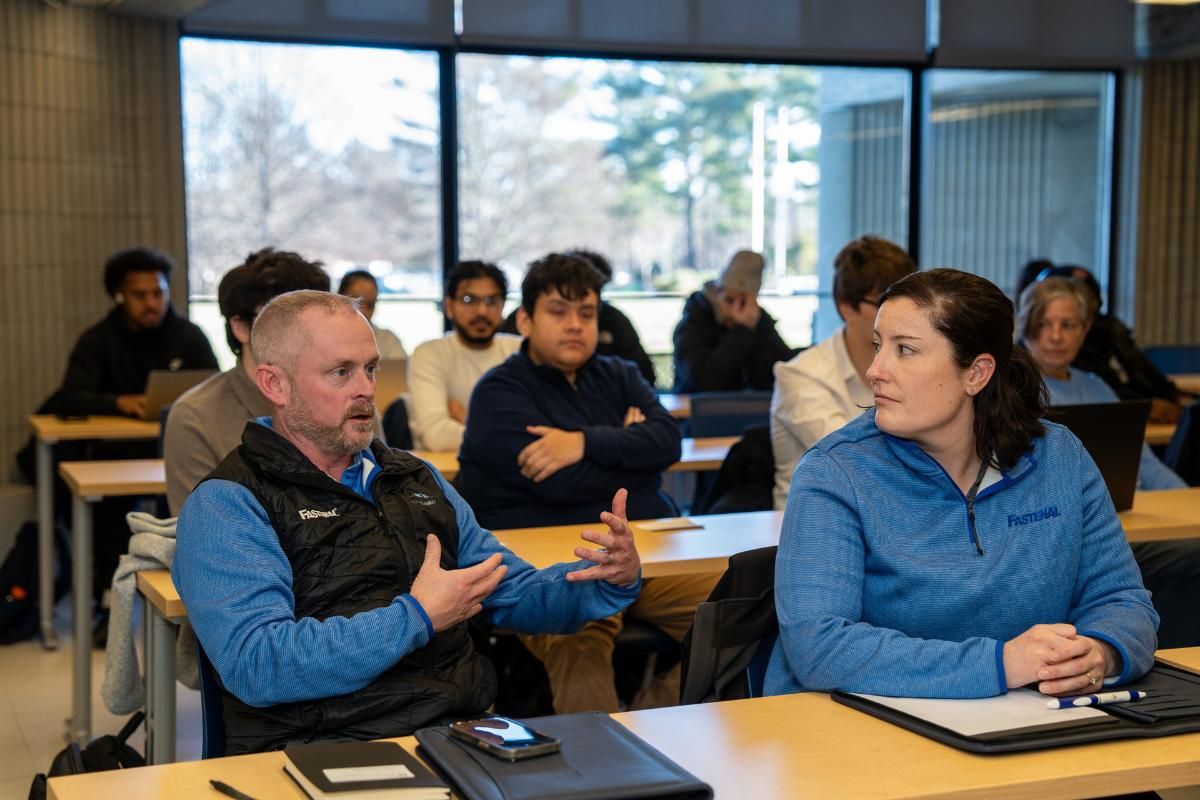 Two Fastenal recruiters Ryan Scott (left) and Katie Cate (right) discuss their collaboration with students from the course.